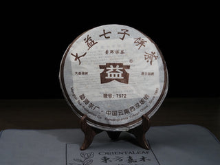 2006 Dayi 7572 ripe Puerh tea cake 357g wrapped in original Menghai paper packaging