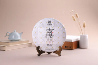 2018 Fengqing Snow Bud Ancient Tree White Tea Cake 357g with minimalist paper wrapping.