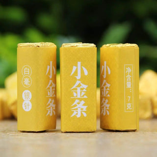 2025 Yunnan Silver Needle white tea sticks in premium yellow gold packaging, 7g individual servings.