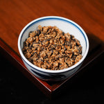 Dry leaves of Fengqing Golden Snail Dianhong Black Tea