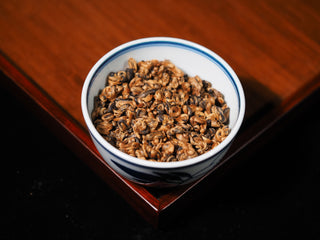 Dry leaves of Fengqing Golden Snail Dianhong Black Tea