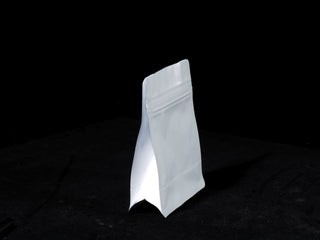 Premium resealable tea sample bag with stand-up pouch design for loose leaf tea storage.