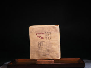 Detailed back label of the 2018 aged Fu Brick tea, showing the handmade craft and technical specifications.
