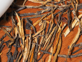 Close-up texture of Imperial Dianhong Black Tea single buds