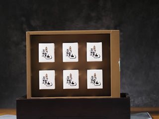 Inner view of Mengku TeaSoul Sheng Pu-erh Coin Tea box, containing 6 mini boxes for convenient brewing