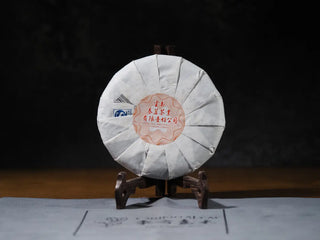 Back packaged view of the Sticky Rice Aroma Raw Pu-erh Cake 2013 200g highlighting wrapper details