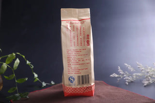 Back label of Yunnan Sheng Puerh tea showing authenticity and origin details.