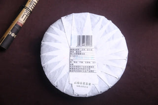Traditional Cotton-Wrapped Dahusai Ancient Tree Raw Pu-erh Tea, Protecting Mengku Gushu