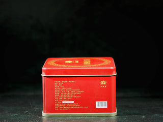 Back view of YXT Jingyang Golden Flower Fu Tea Special Grade 300g red can, showing production details, ingredients, and certification.