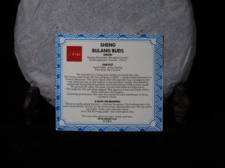 Detailed English description and brewing guide insert card for Sheng Bulang Buds raw Puerh tea.