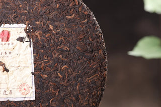 Close-up of Premium Imperial Grade Ripe Pu-erh tea leaves with golden buds