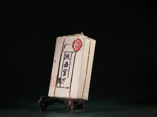 Side view of the On Taoism (Jingtai Hao) Master-Crafted Jingyang Golden Flower Fubrick, highlighting the packaging seal.