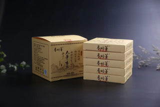 Two Stacked Boxes of Xiangzhuqing Taihua Ancient Tree Raw Pu-erh 2016 Waffle Tea. Bulk Packaging Display.