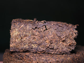 Close-up of the 2018 aged Fu Brick surface, showing the dense texture from artisanal hand-pressing.
