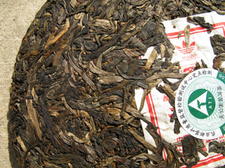 Texture detail of 20-year aged raw Pu-erh dry leaves from Mangbo mountain.