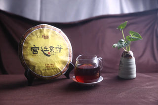 Lifestyle photography of vintage Lincang shou puerh tea for sale, perfect for traditional Gongfu tea sessions.