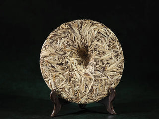 Back unwrapped view of 2023 Jinggu Yunnan Silver Needle White Tea Cake