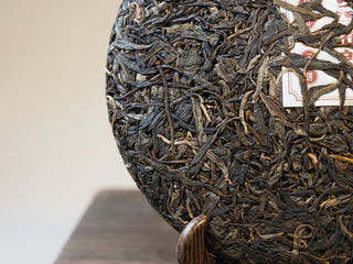 High-resolution texture of premium ancient tree sheng pu-erh tea leaves