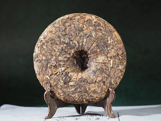 Back view of Yunnan High Mountain Wild Ancient Tree Shoumei White Tea Cake (2019) without packaging