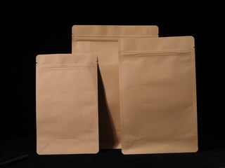 Set of assorted size kraft paper tea bags with aluminum foil lining