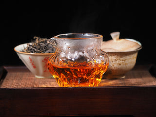 Amber liquor of Ancient Tree Dianhong Black Tea in a pitcher