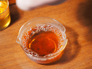 Rich, deep orange-red liquor color of the brewed YXT Jingyang Golden Flower Fu Tea First Grade 300g, indicating maturity.