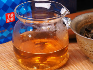 Clear and bright amber tea soup from Xiaguan 18-year aged wild ancient tree Puerh.