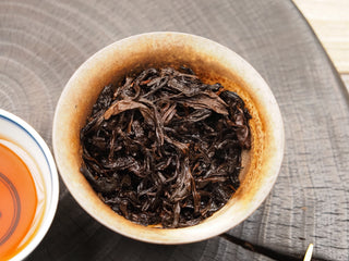 Close-up of fully steeped 2024 Bulang Mountain bold ripe pu-erh tea leaves