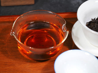 Professional tea ceremony presentation of 2014 Vintage Fu Brick Golden Flower tea.