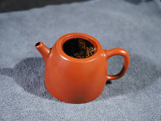 Classic Chinese Yixing teapot prepared with premium 5-year aged Yunnan dark tea.