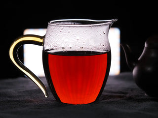 Clear and rich ruby-red infusion of 2023 Fengqing Golden Flower Dark Tea.