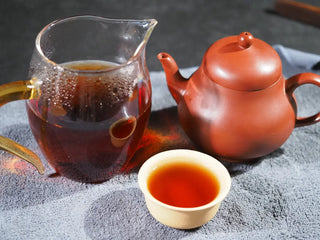 Authentic Chinese tea ceremony set featuring On Taoism Golden Flower Fu Brick Tea.