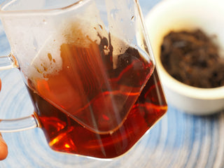 Close-up of clear, bright dark-red liquor clarity of the 2005 Lincang aged Shou Pu-erh tea