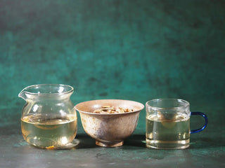 Gaiwan with fair cup and a tasting cup filled with liquor from 2023 Jinggu Bai Hao Yin Zhen Silver Needle White Tea