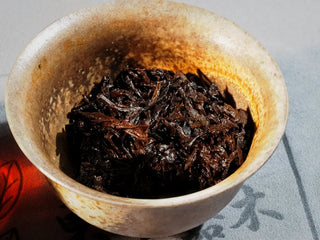 Close-up of tea leaf base (yebu) from gongdao cup, showing soft, elastic leaves and even color after brewing