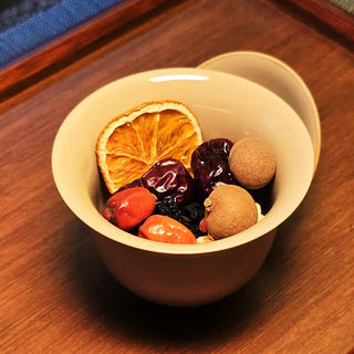 Fu Brick Tea Three-Cannon Shot (San Pao Tai 三炮台) in a gaiwan