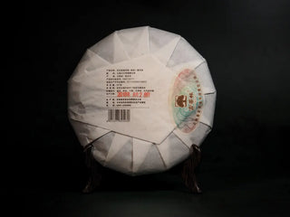 Back view of the packaged 2018 Ancient Grove Aged Ripe Pu-erh Tea Cake, highlighting production details and vintage seal