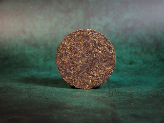 Chang'an Golden Flower Fu Brick Tea Mini Cake – 60g unwrapped front view of the tea cake