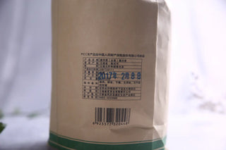 Close-up of Yunnan Lincang Raw Pu-erh Tea Bag Label and Product Information